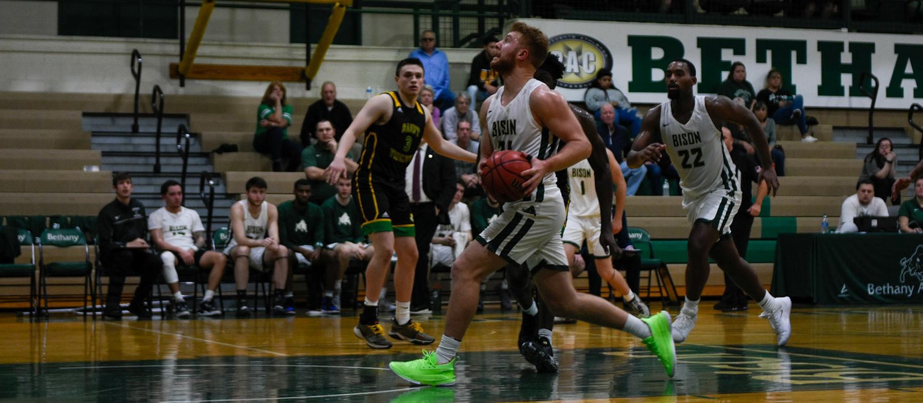 Men's Basketball Defeated on Road to Wolverines