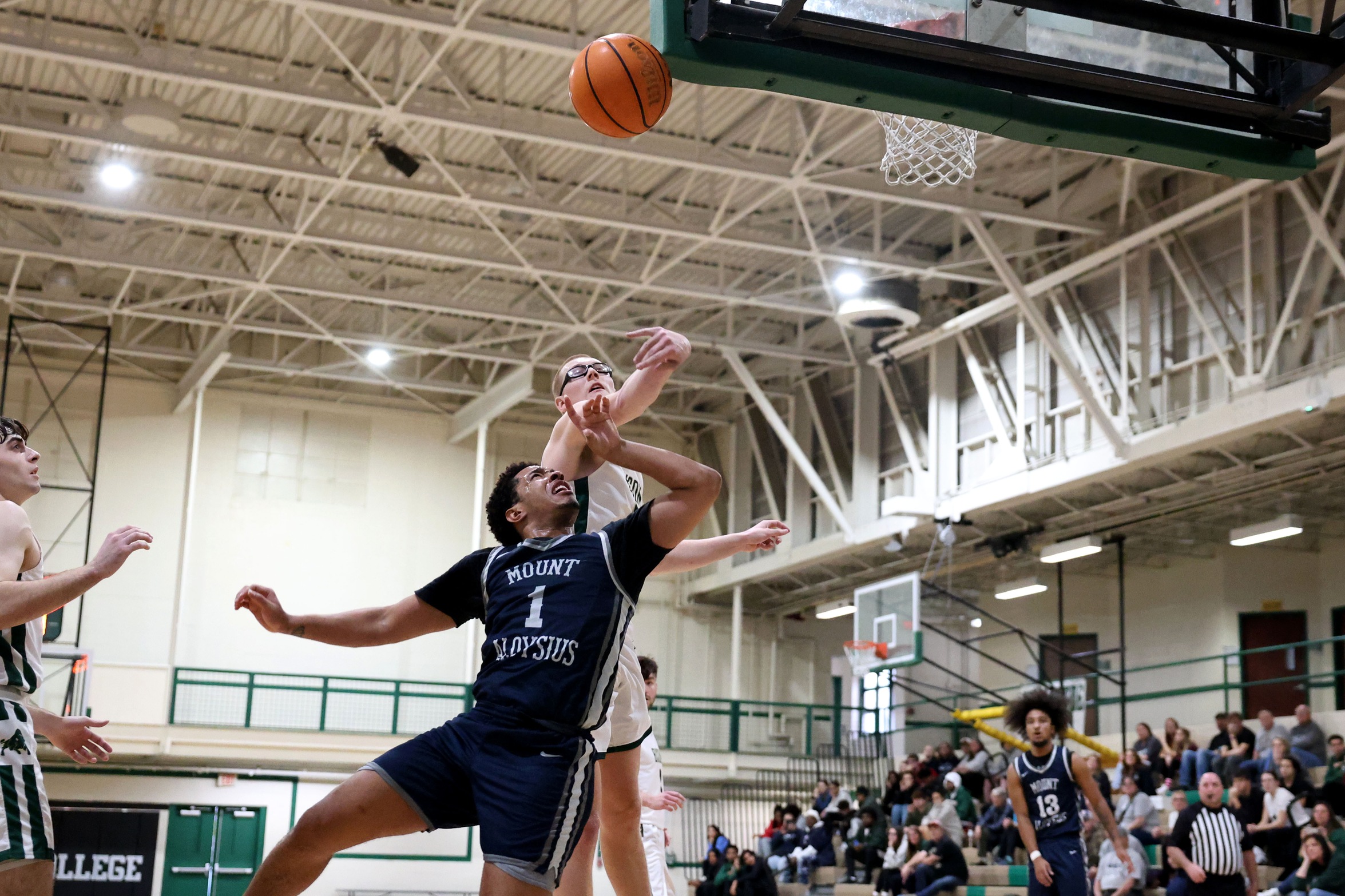 Bison Slam 75 Point Half; Dailey Breaks Block Record